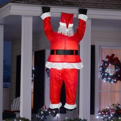 Home Accents Holiday 6.5 ft. Inflatable Airblown Santa Hanging from Roof